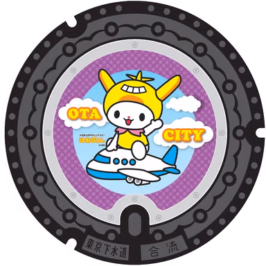 Ota Design Manhole 002 — JR Kamata Station west-exit plaza, Nishikamata 7-68, Ota, Tokyo